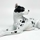 Antique figurine of a lying dog