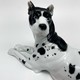 Antique figurine of a lying dog