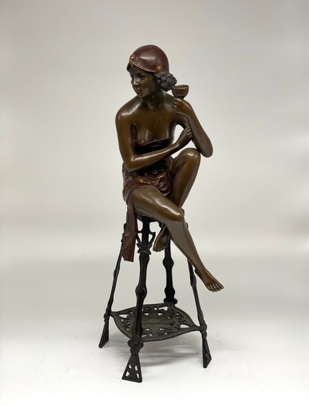 Antique sculpture "Girl on a chair"