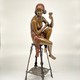 Antique sculpture "Girl on a chair"