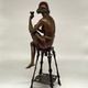 Antique sculpture "Girl on a chair"