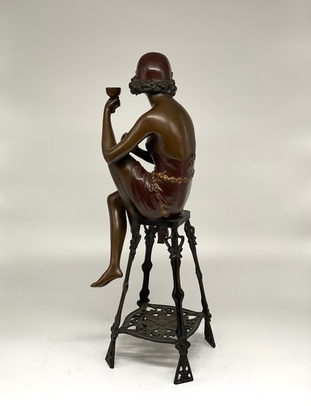 Antique sculpture "Girl on a chair"