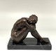 Antique sculpture "Naked Dreamer"