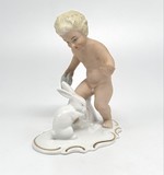 Антикварная статуэтка "Путти с кроликом" Антикварная статуэтка "Путти с кроликом"