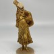 Antique sculpture "Girl in gold"