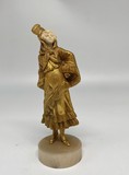 Antique sculpture "Girl in gold"