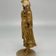 Antique sculpture "Girl in gold"