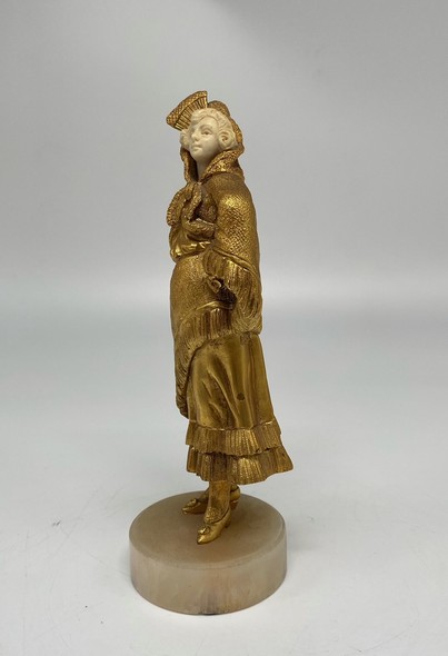 Antique sculpture "Girl in gold"