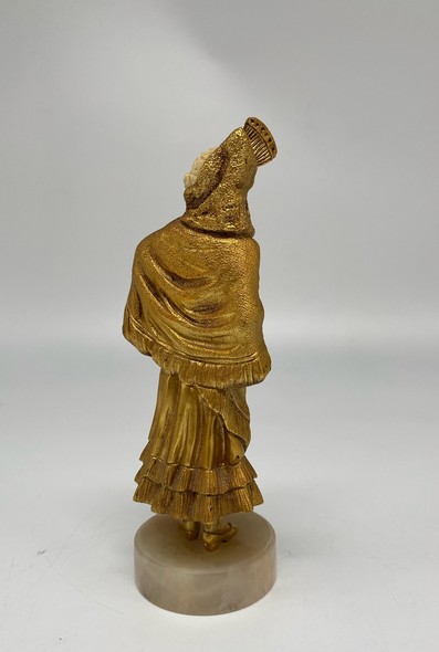 Antique sculpture "Girl in gold"