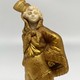 Antique sculpture "Girl in gold"