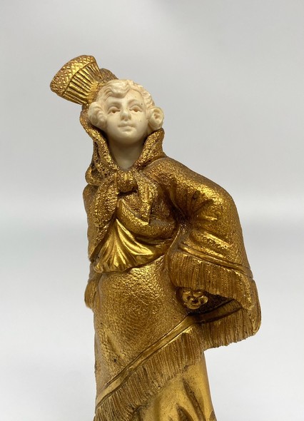 Antique sculpture "Girl in gold"