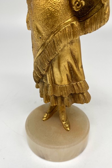 Antique sculpture "Girl in gold"