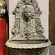 Wall-mounted ancient fountain