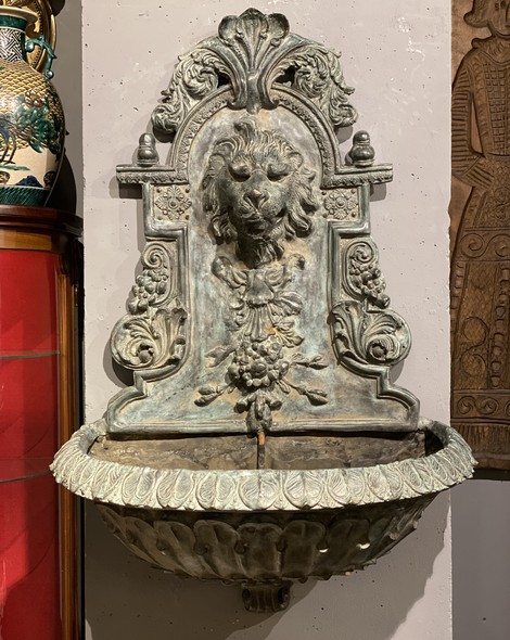 Wall-mounted ancient fountain