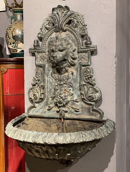 Wall-mounted ancient fountain