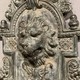 Wall-mounted ancient fountain
