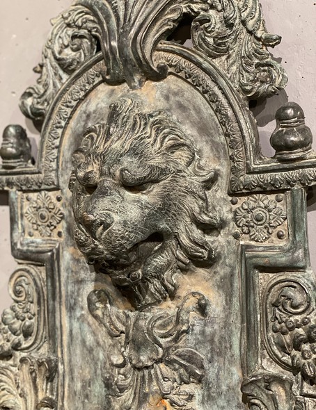 Wall-mounted ancient fountain
