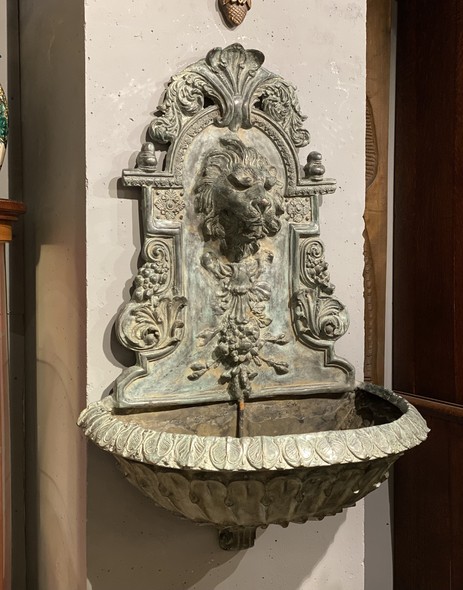 Wall-mounted ancient fountain