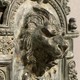 Wall-mounted ancient fountain