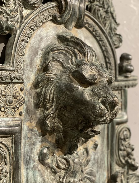 Wall-mounted ancient fountain