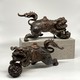 Antique paired sculpture "Dogs Fo"