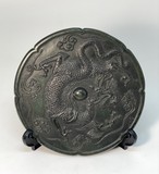 Bronze stand in the form of a shield "Dragon" Bronze stand in the form of a shield "Dragon"