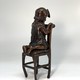 Vintage statuette "Girl on a chair"