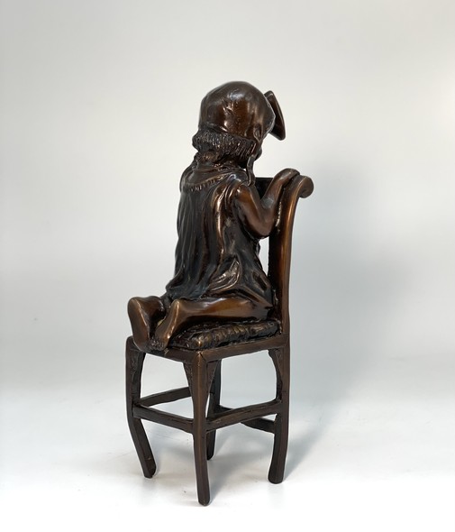 Vintage statuette "Girl on a chair"