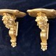 Antique paired consoles