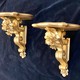 Antique paired consoles