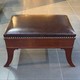 Antique brown leather banquette