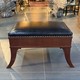 Antique brown leather banquette