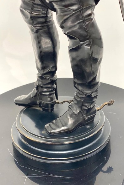 Antique sculpture "Musketeer"