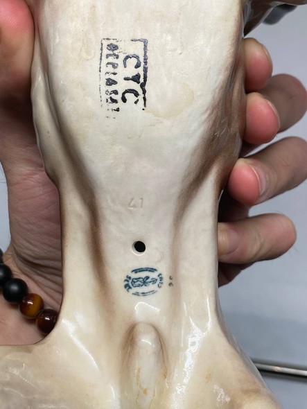 "Dog with a Bird in Its Mouth" Figurine