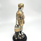 Vintage sculpture
"Japanese Woman with a Basket"