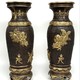 Paired oriental vases
with dragons and Bodhisattvas