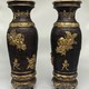 Paired oriental vases
with dragons and Bodhisattvas