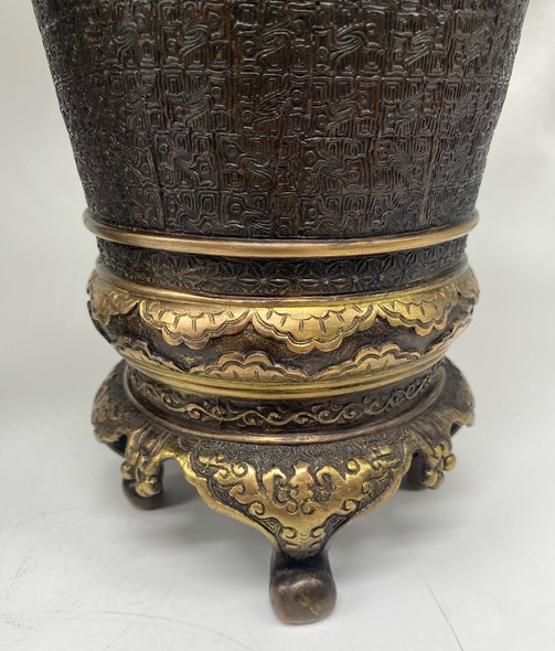 Paired oriental vases
with dragons and Bodhisattvas