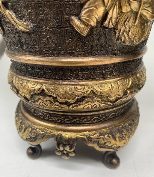 Paired oriental vases
with dragons and Bodhisattvas
