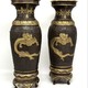 Paired oriental vases
with dragons and Bodhisattvas