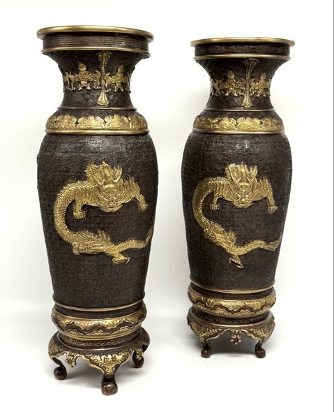 Paired oriental vases
with dragons and Bodhisattvas