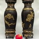 Paired oriental vases
with dragons and Bodhisattvas