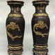 Paired oriental vases
with dragons and Bodhisattvas