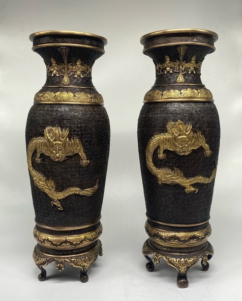 Paired oriental vases
with dragons and Bodhisattvas