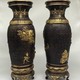 Paired oriental vases
with dragons and Bodhisattvas