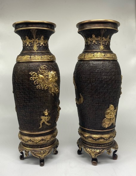 Paired oriental vases
with dragons and Bodhisattvas