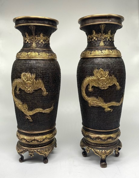 Paired oriental vases
with dragons and Bodhisattvas
