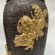 Paired oriental vases
with dragons and Bodhisattvas