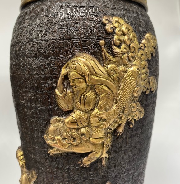 Paired oriental vases
with dragons and Bodhisattvas
