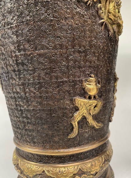 Paired oriental vases
with dragons and Bodhisattvas